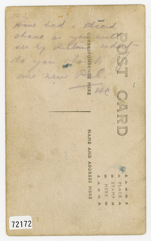 Verso of postcard of Harry Colebourn feeding Winnie